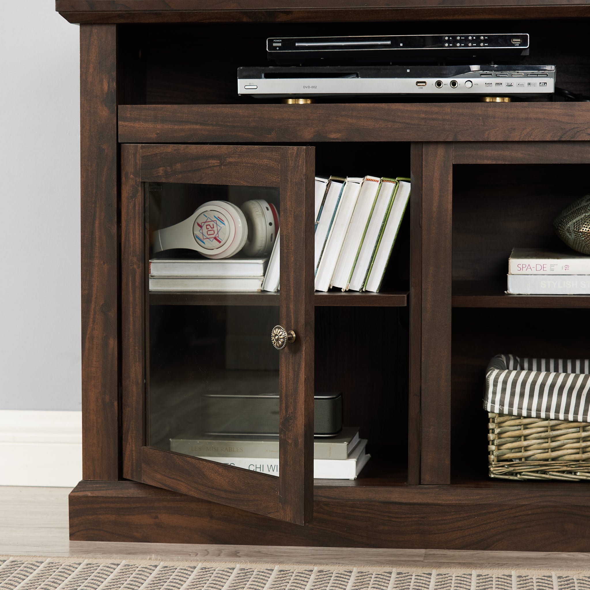 Anthony & Home Atelier Collection TV console for 65-inch TVs, brown finish, minimalist entertainment cabinet with sleek storage spaces.