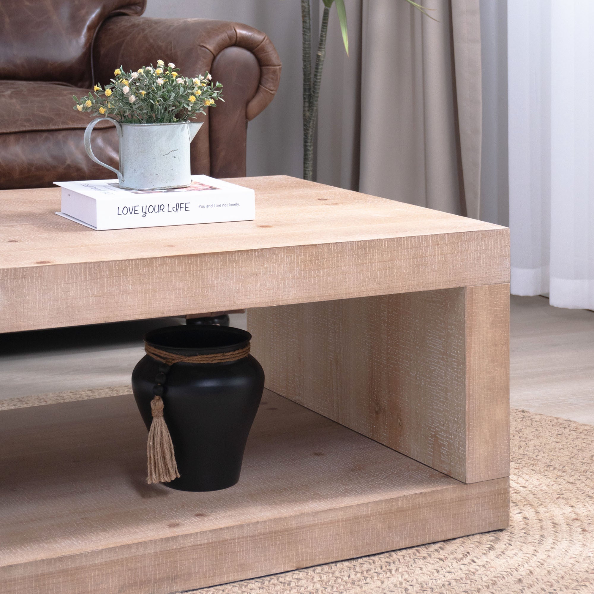 Solid wood coffee table with a light natural finish and open shelf from Anthony & Home's Modern Farmhouse Collection.