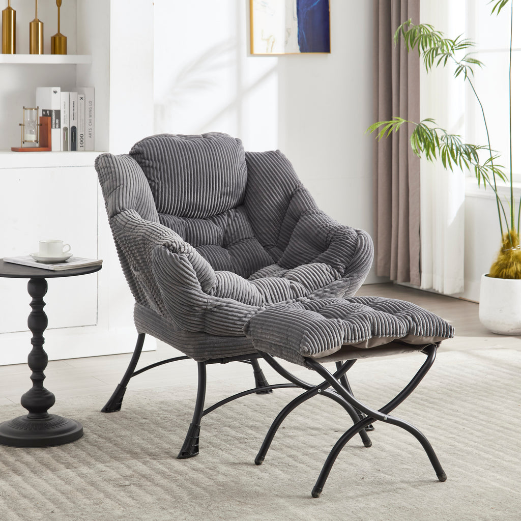 Grey upholstered lounge chair with matching ottoman and armrests from Anthony & Home, stylish and comfortable for living space.