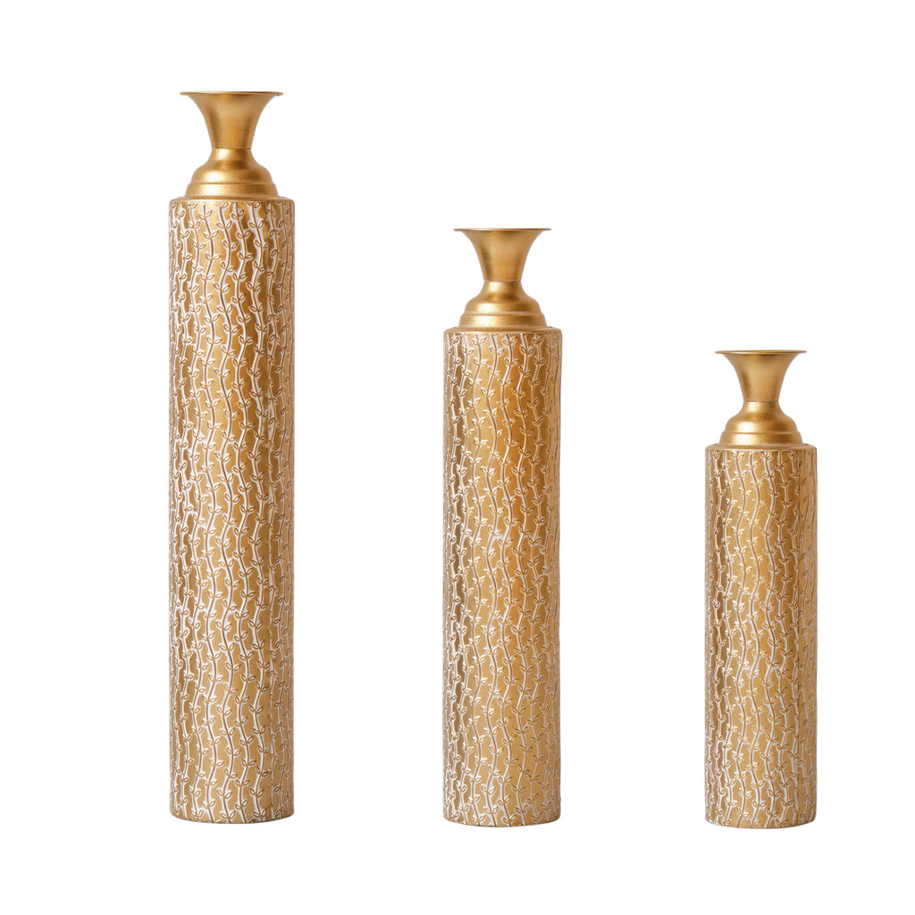 Set of three Anthony & Home Heritage Collection gold distressed metal vases with vine pattern for living room decor.