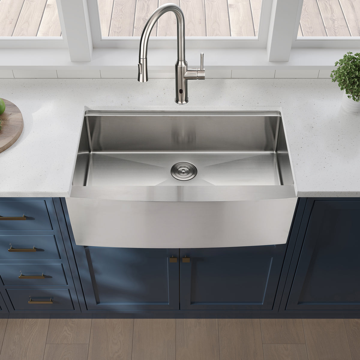 Stainless steel farmhouse apron kitchen sink workstation with deep basin and modern design by Anthony & Home.