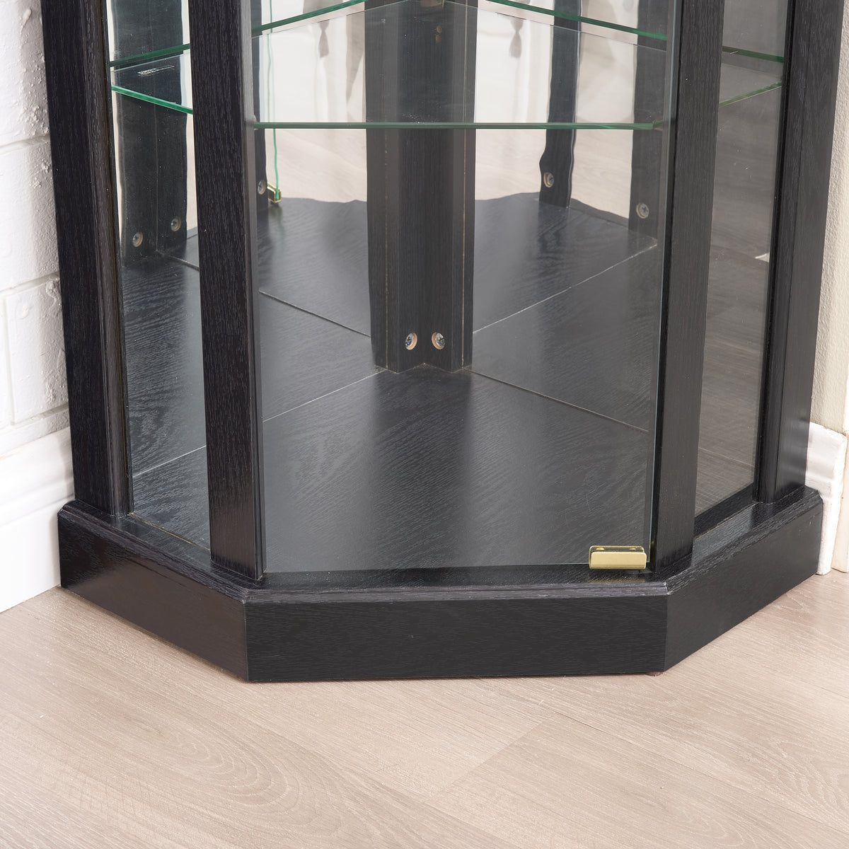 Heritage Anthony & Home lighted corner curio cabinet with glass display for antiques and wine collections.