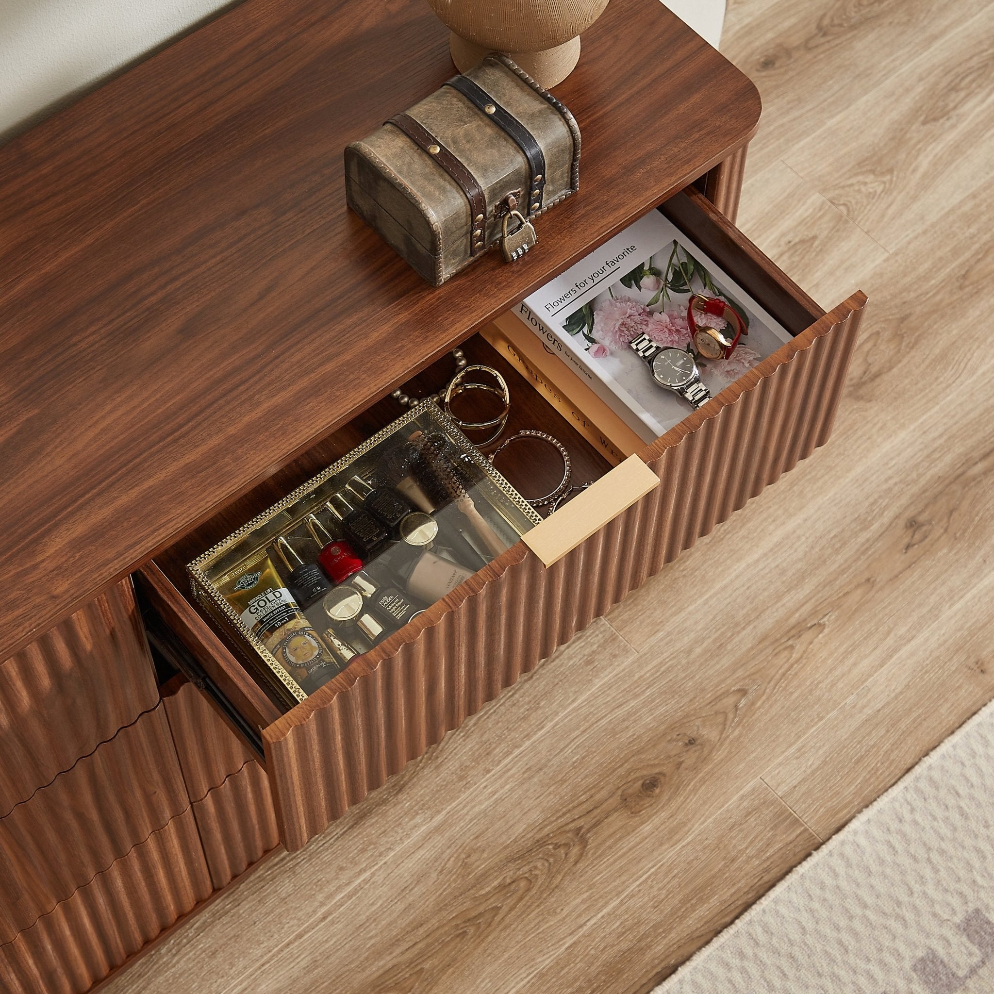Walnut Wave six-drawer dresser and TV stand by Anthony & Home with a curved profile in a 55-inch wide Studio Collection design.
