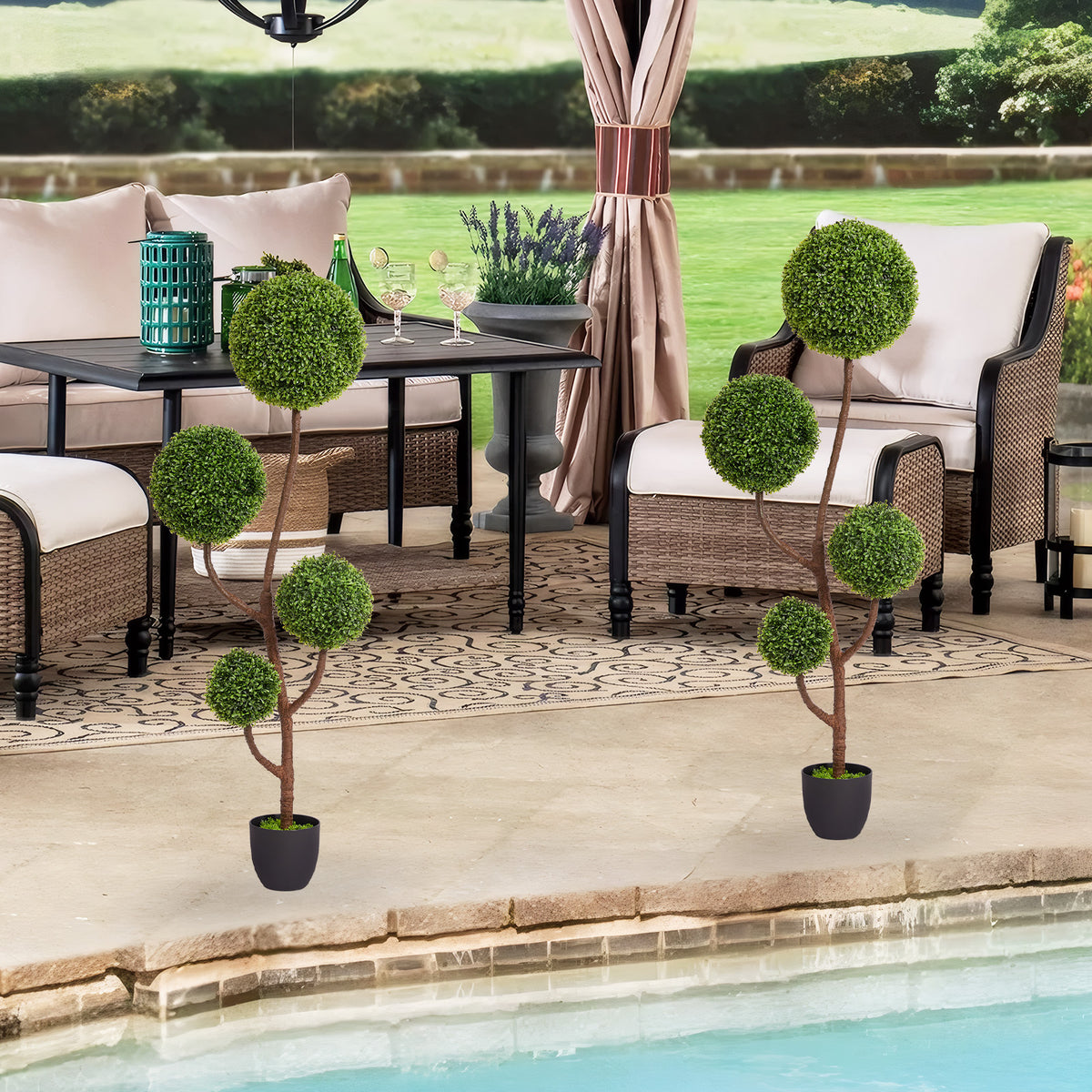 Boxwood topiary tree with triple ball shape, 59 inches tall, from Anthony & Home's Atelier collection, displayed in a garden setting