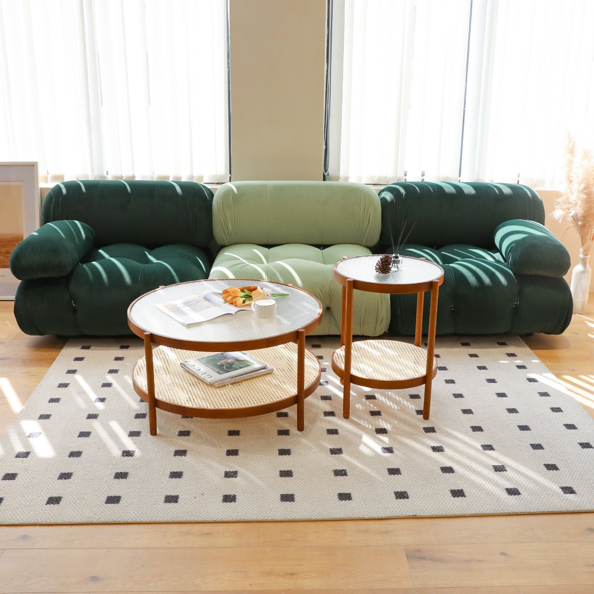 Nestling round wood coffee tables from Anthony & Home with tempered glass tops, modern and stylish living room furniture.