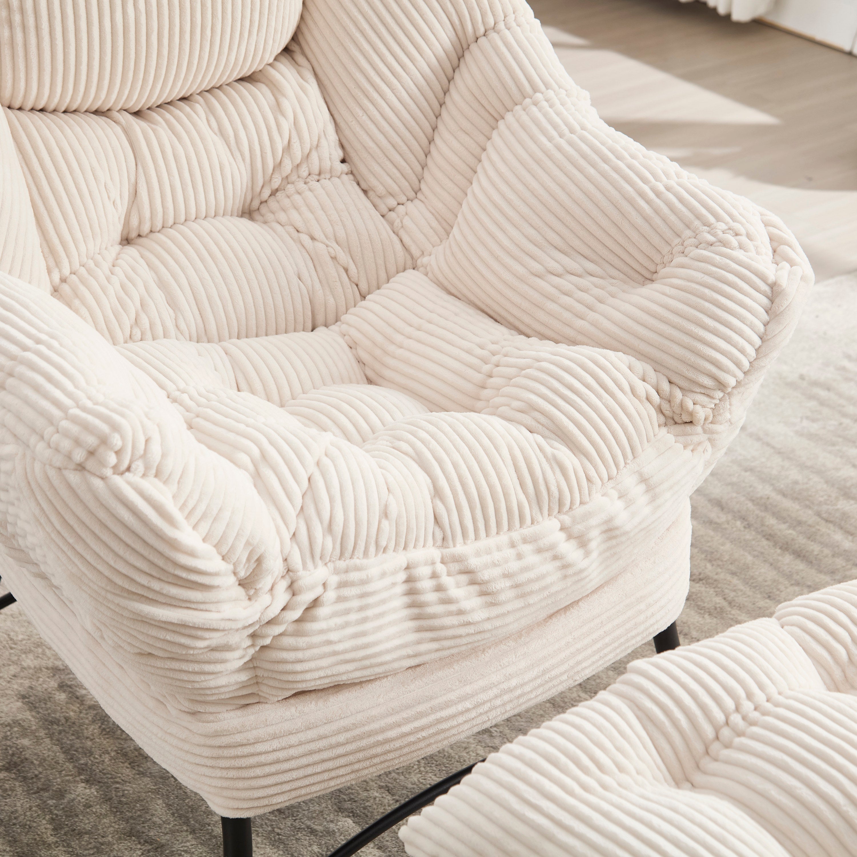 Ivory upholstered lounge chair with matching ottoman and side pocket, modern reading nook accent by Anthony & Home
