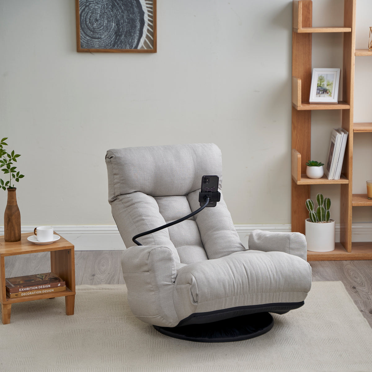 Gray Anthony & Home swivel lounge chair with 360-degree rotation, featuring a modern design and comfortable upholstery.