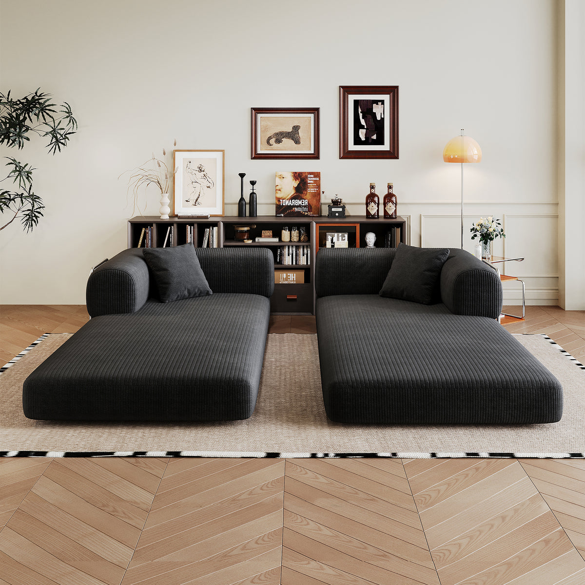 Black corduroy convertible sofa bed from Anthony & Home's Atelier Collection, showing the stylish sofa in both sitting and bed modes.