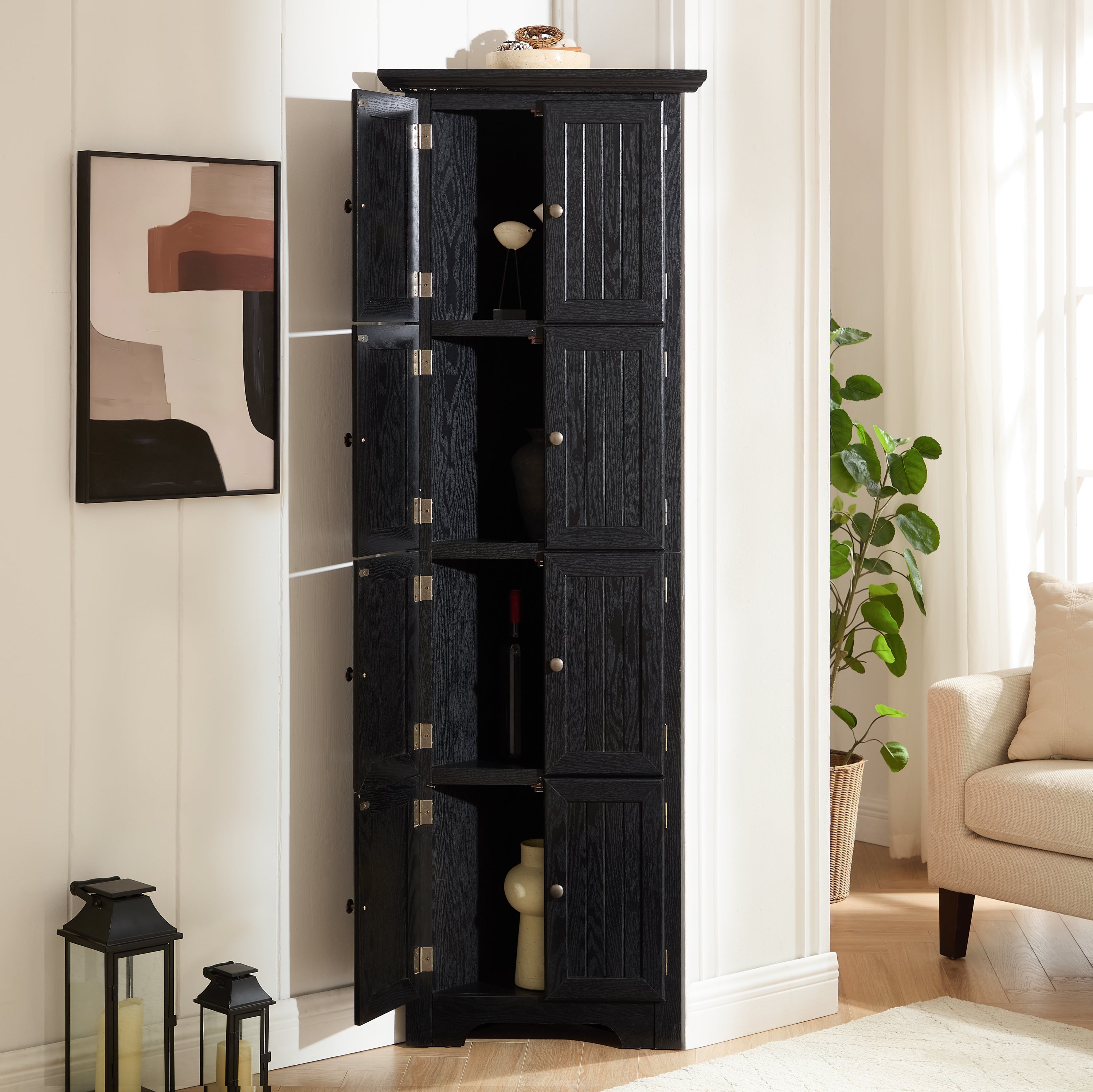 Corner pantry cabinet in matte black finish from Anthony & Home's Studio Collection, featuring shelves and storage space.