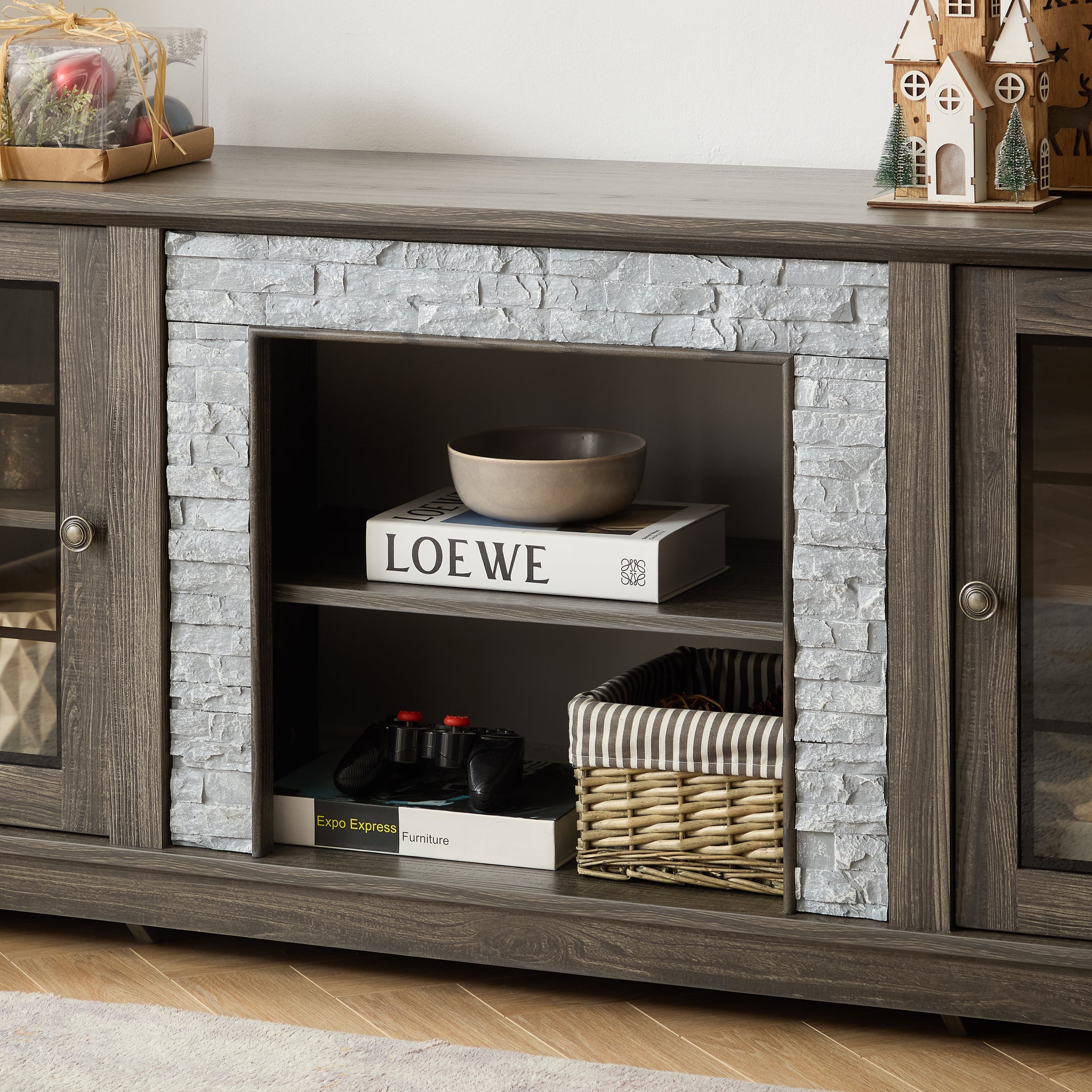 Anthony & Home Atelier Faux Stone TV stand in grey featuring a modern design with storage compartments and sleek finish.