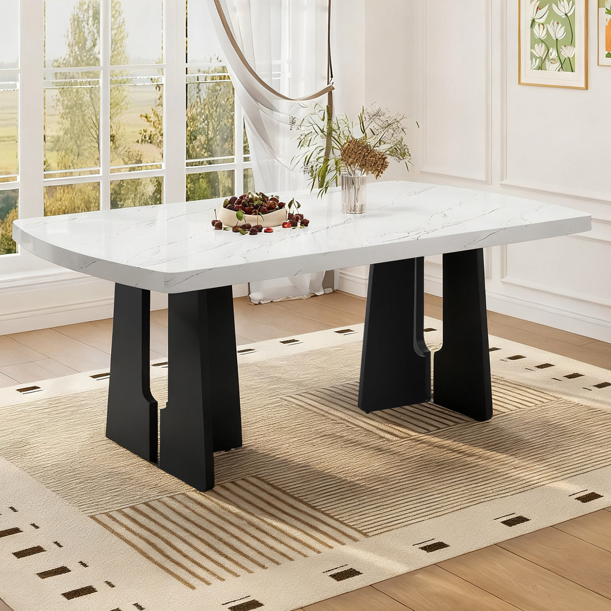 Black and white faux marble dining table with geometric legs by Anthony & Home, showcasing a modern, stylish design.