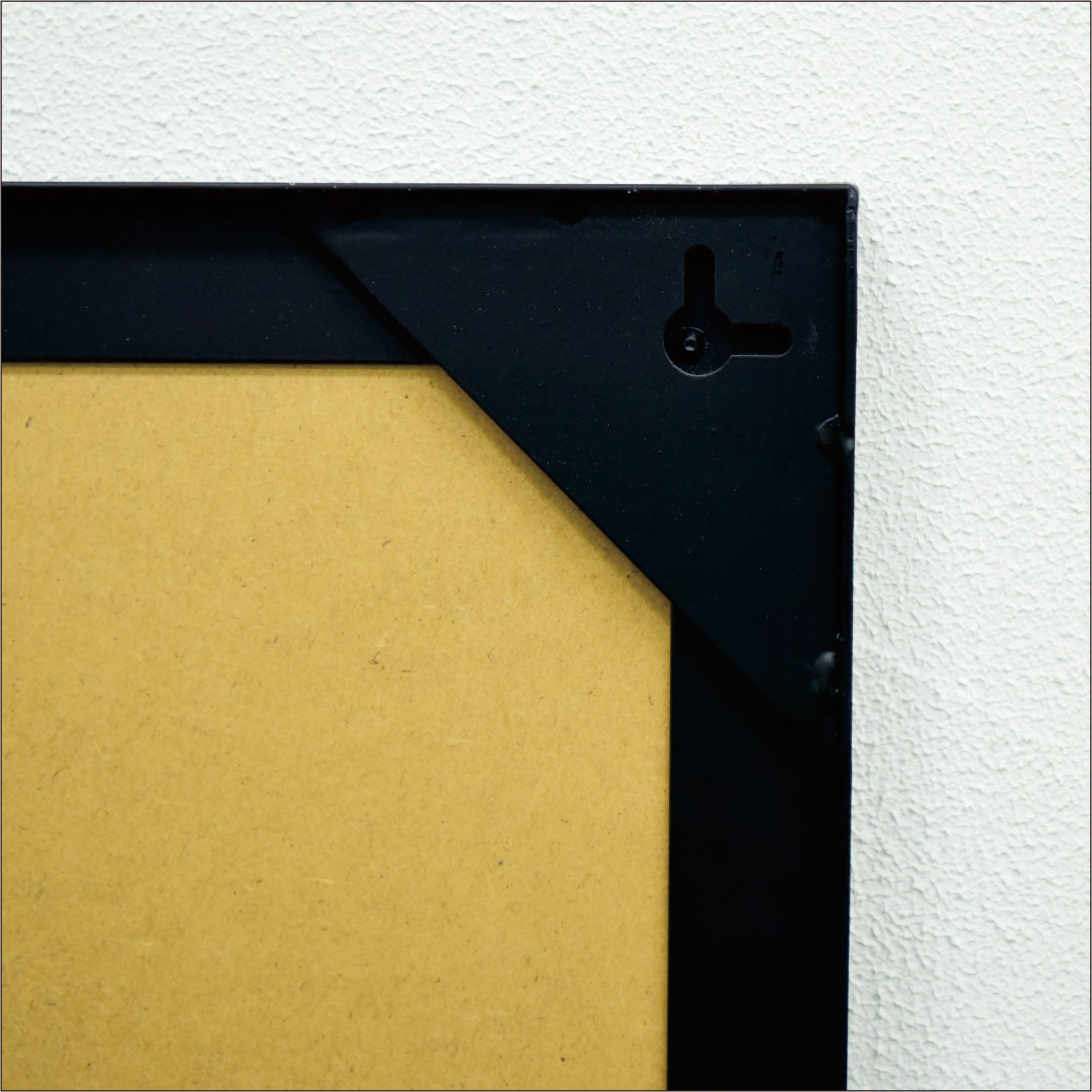 Square wall mirror from Anthony & Home's Atelier Collection with a sleek frame, ideal for modern interior decor.