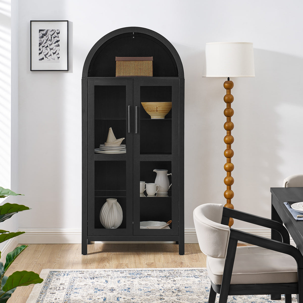 Black arched lamp cabinet with glass partitions, designed for modern interior spaces by Anthony & Home.