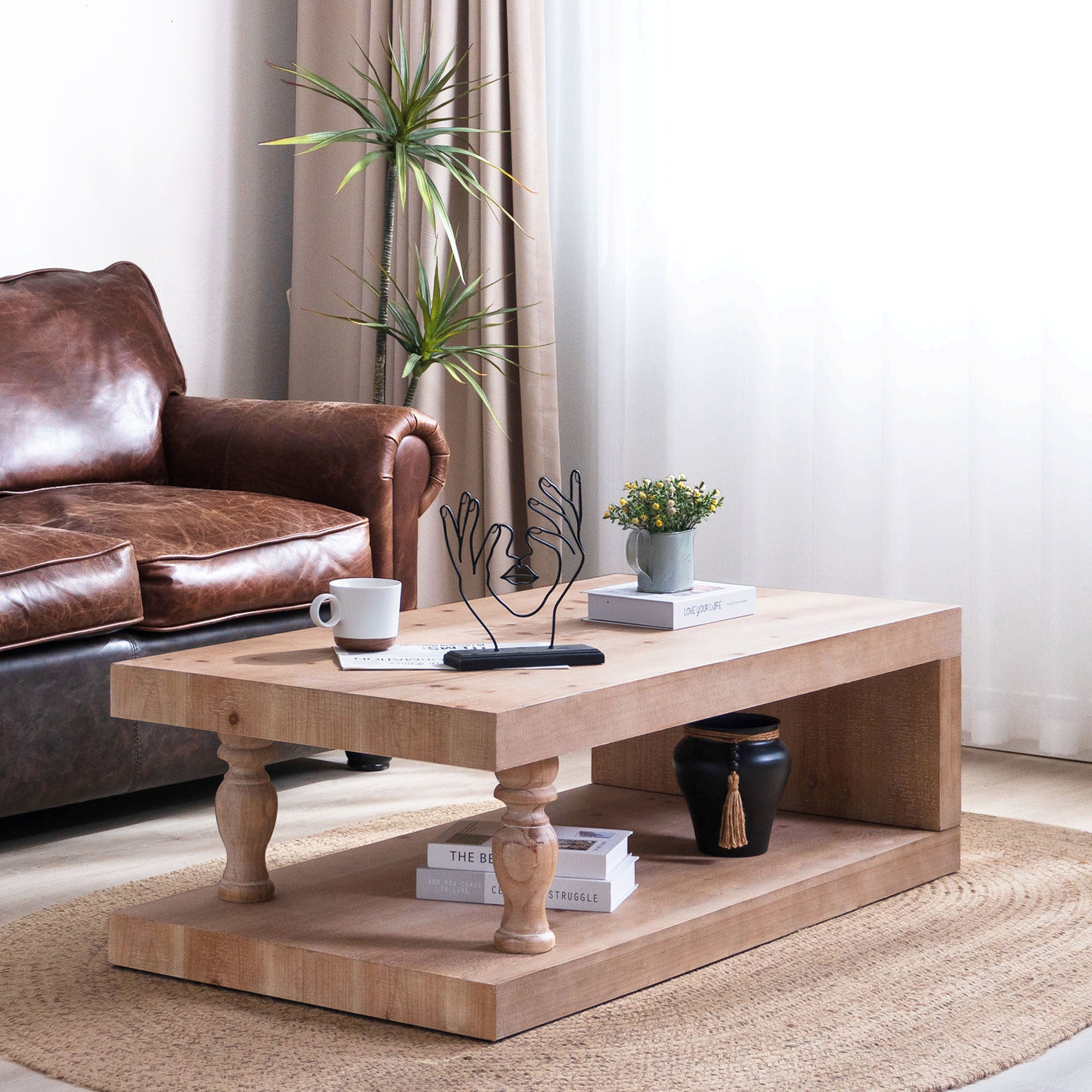 Solid wood coffee table with light natural finish and open shelf, in modern farmhouse style by Anthony & Home