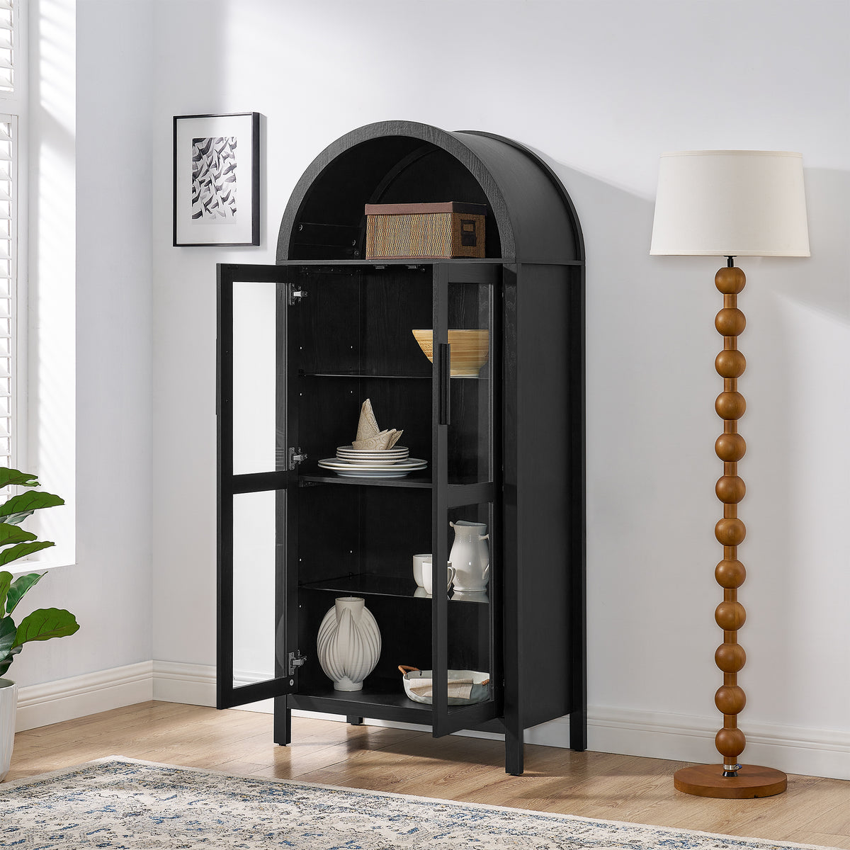 Black arched lamp cabinet with glass partition, designed by Anthony & Home, featuring a stylish, modern atelier aesthetic.