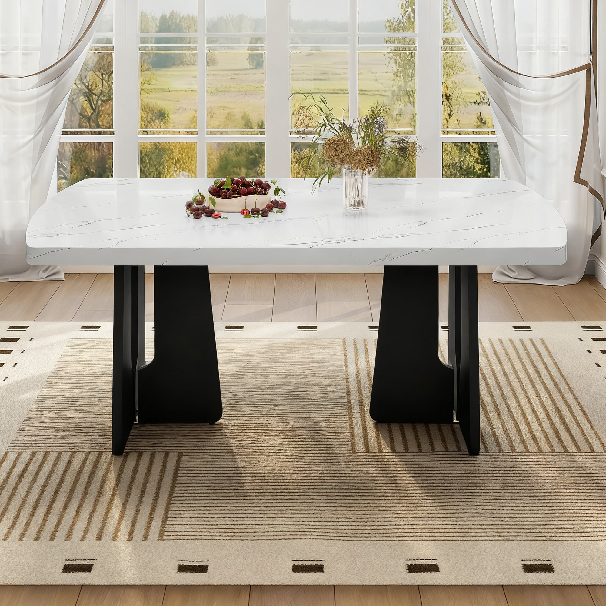 Black and white faux marble dining table with geometric black legs by Anthony & Home