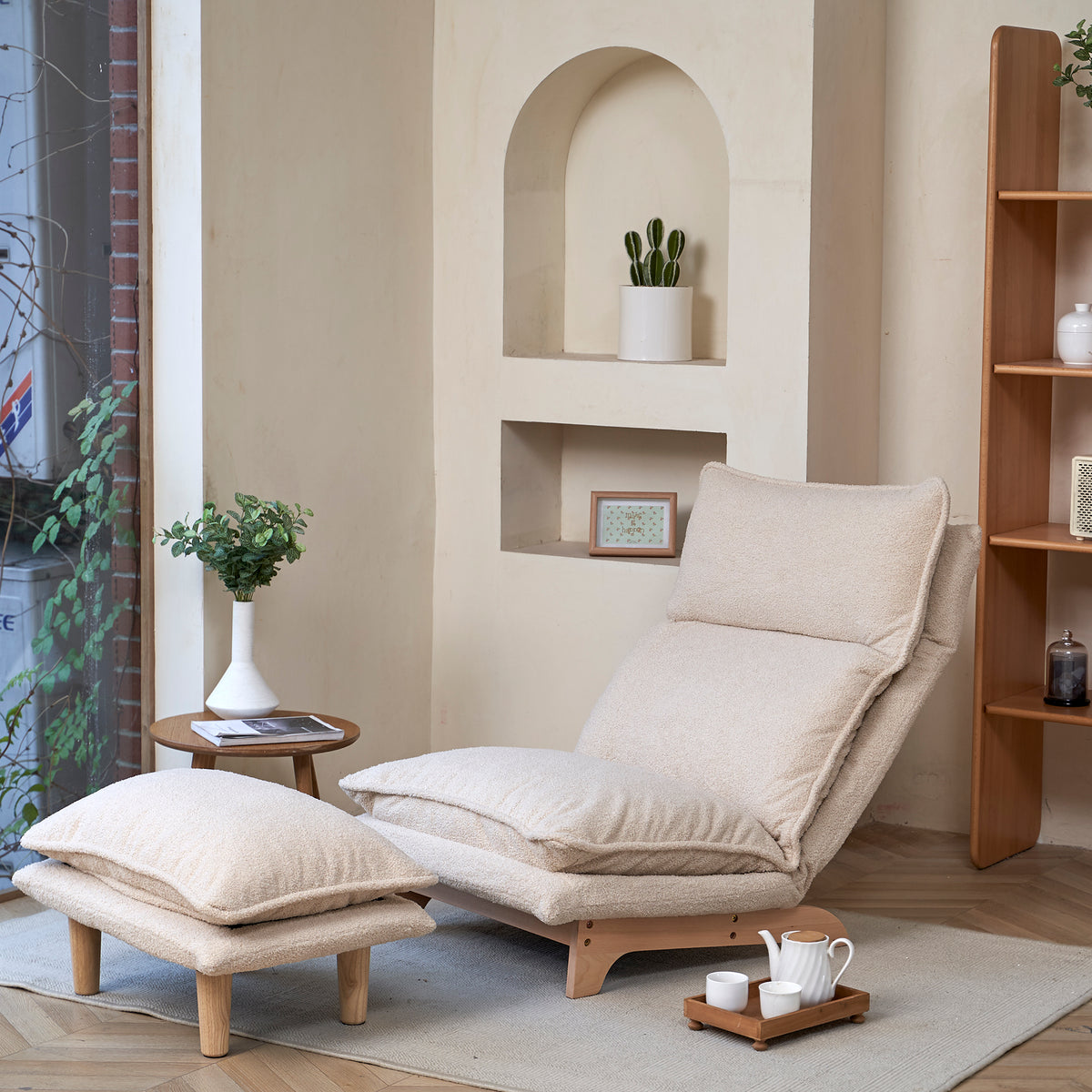 Beige Studio foldable metal frame recliner by Anthony & Home, showing the sleek, comfortable design with fabric upholstery and adjustable features.