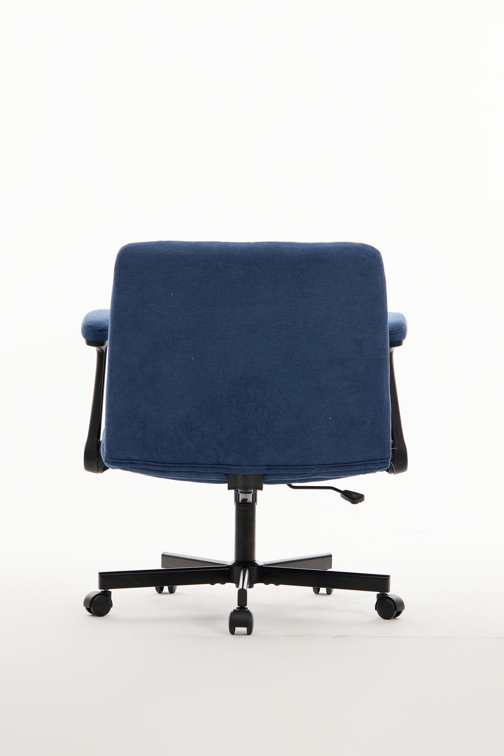 Anthony & Home Atelier velvet office chair with crisscross armrests, featuring plush upholstery and modern design.