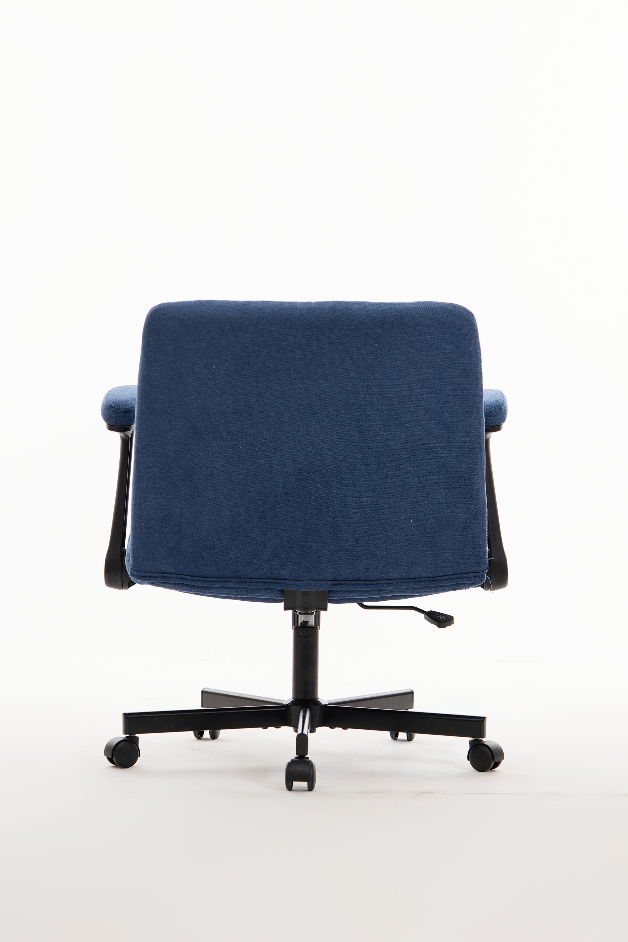 Anthony & Home Atelier velvet office chair with crisscross armrests, featuring plush upholstery and modern design.