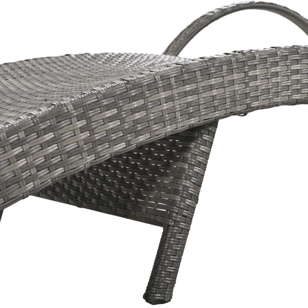 Outdoor wicker chaise lounge set with ergonomic wave design in grey by Anthony & Home, featuring cushioned seating and stylish wicker frame.