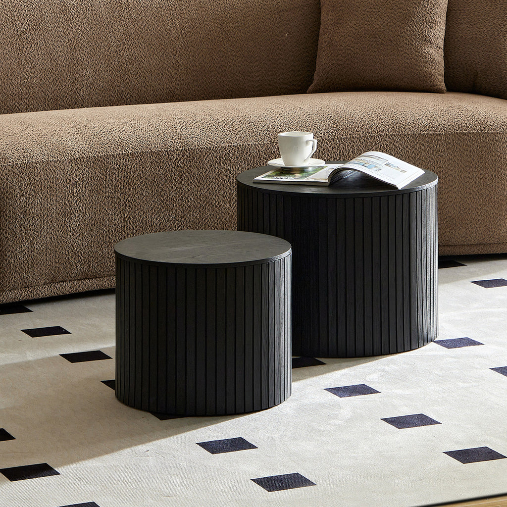 Two black walnut veneer nesting coffee tables with sleek design from Anthony & Home, featuring a modern, two-piece set.