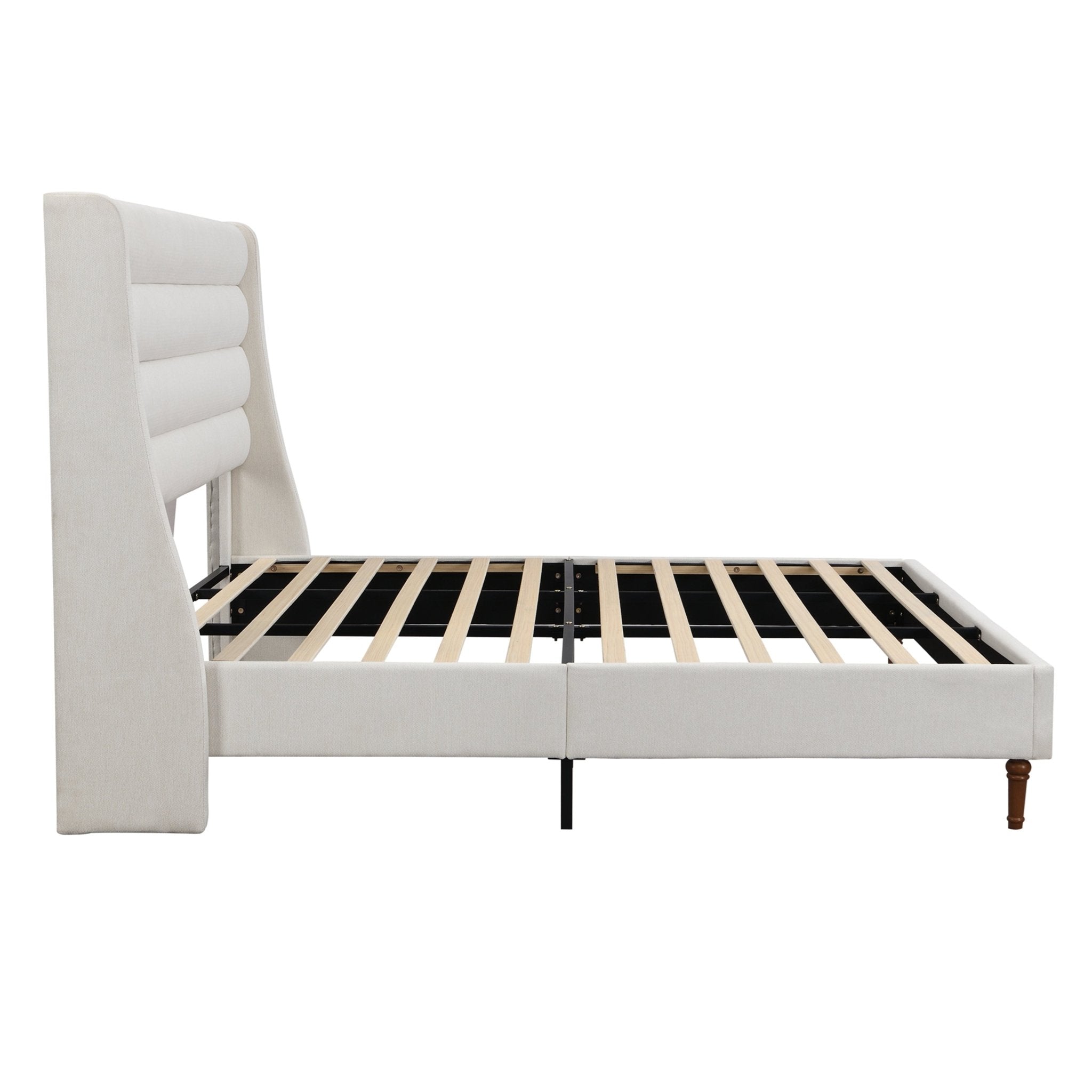 Upholstered bed frame with wave-shaped headboard from Anthony & Home's Exclusive Collection, showcasing plush fabric and modern design.