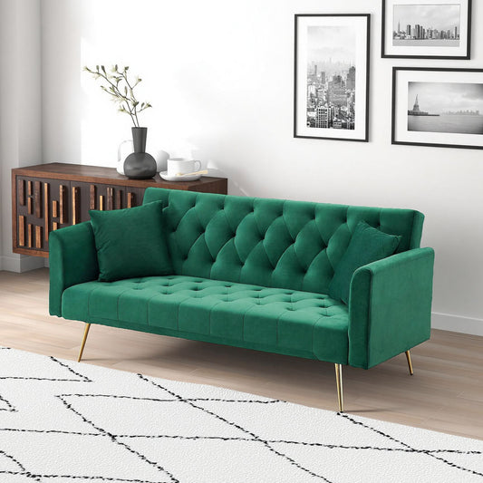 Green velvet convertible love seat by Anthony & Home with plush cushions and sleek design, perfect for modern living spaces.