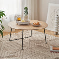 Marble-top round coffee table by Anthony & Home, minimalist American design, ideal for small apartments, with sleek modern style.