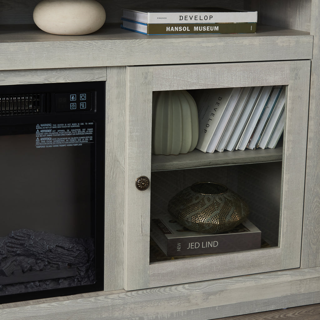 Stone gray finish studio TV media console with built-in fireplace from Anthony & Home, showcasing sleek design and modern style.