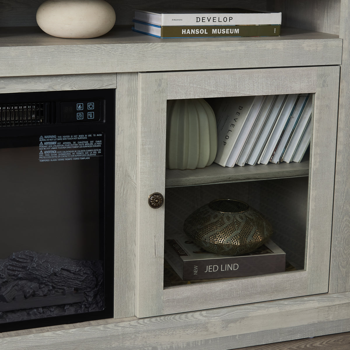 Stone gray finish studio TV media console with built-in fireplace from Anthony & Home, showcasing sleek design and modern style.