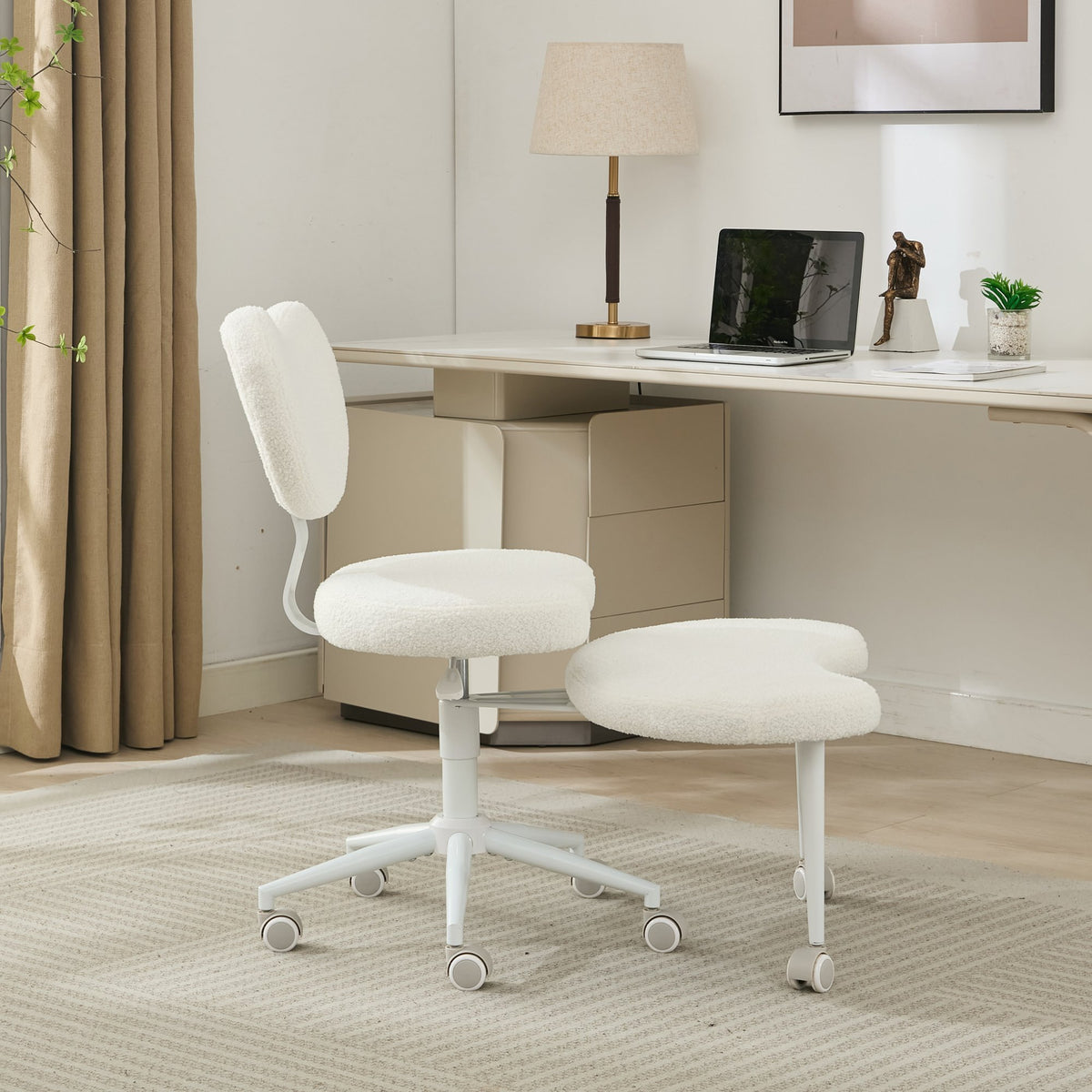 Ivory cross-legged meditation chair with wheels by Anthony & Home, designed for comfortable seated meditation practice.
