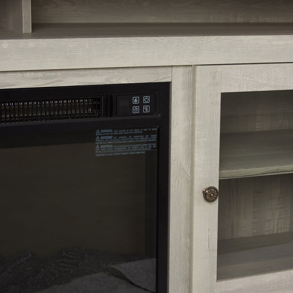 Stone gray finish studio TV media console with built-in fireplace from Anthony & Home, showcasing modern design and ample storage.
