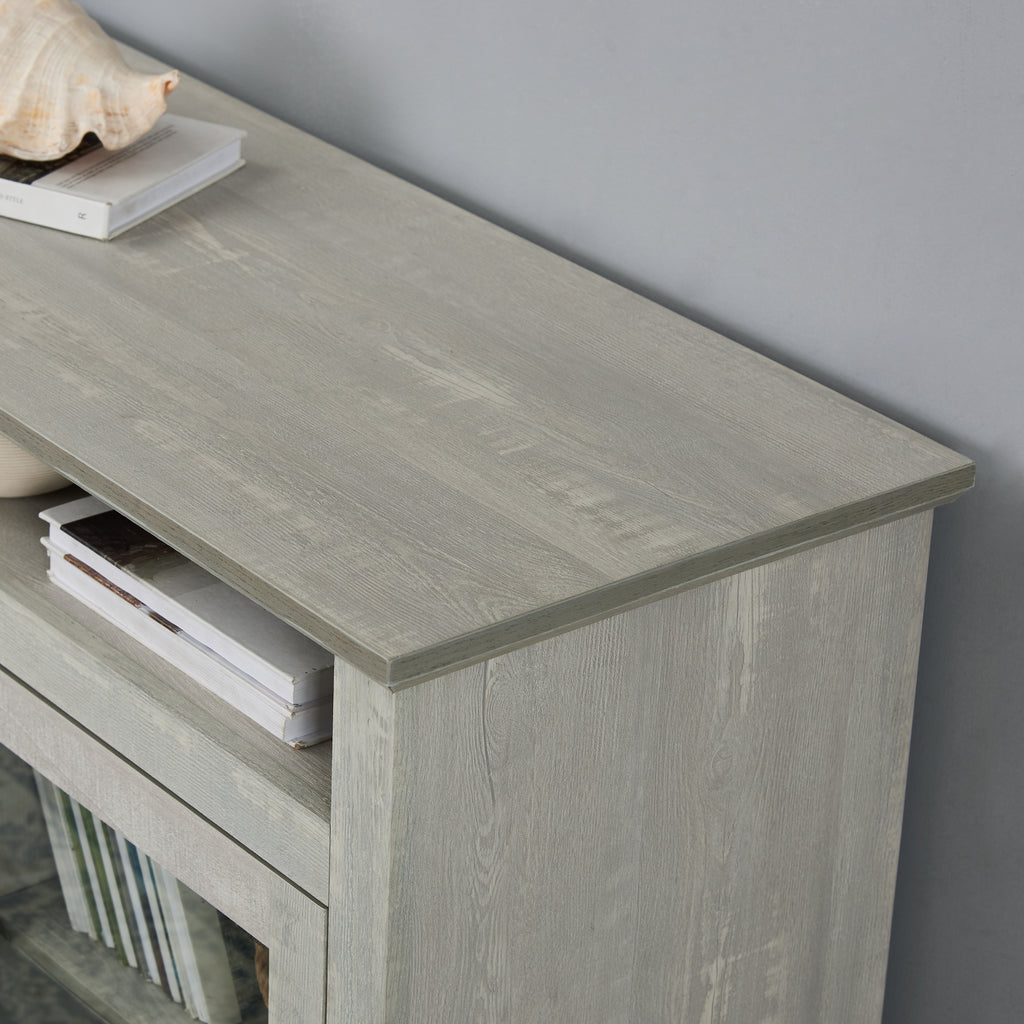 Stone gray finish Studio TV media console with built-in fireplace from Anthony & Home, showcasing modern design and clean lines.