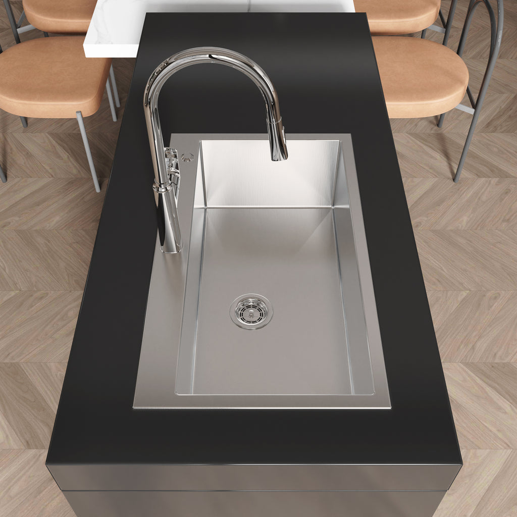 Anthony & Home Studio brushed nickel overmount kitchen sink shown with smooth, deep basin and sleek finish for modern kitchen design.