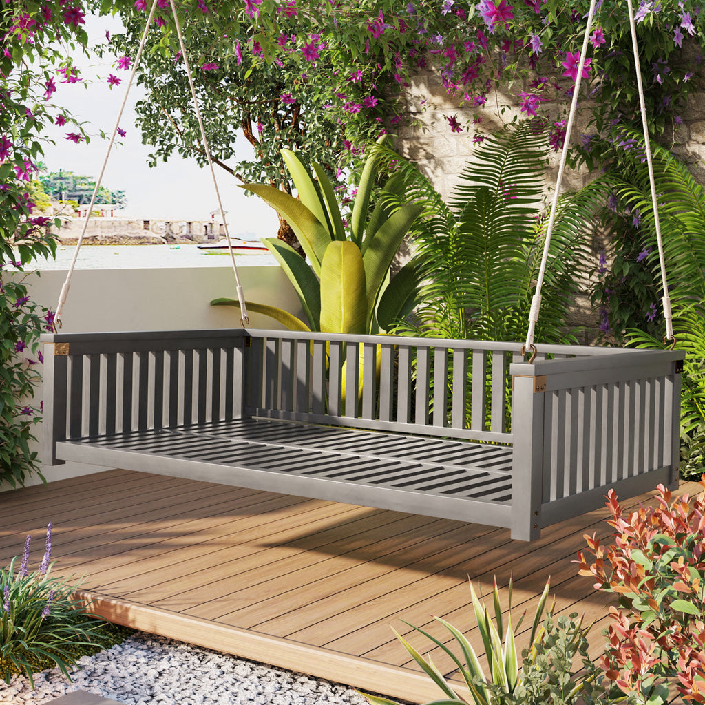 Twin size solid wood garden swing bed with rope support by Anthony & Home, showcasing a cozy outdoor relaxation spot.