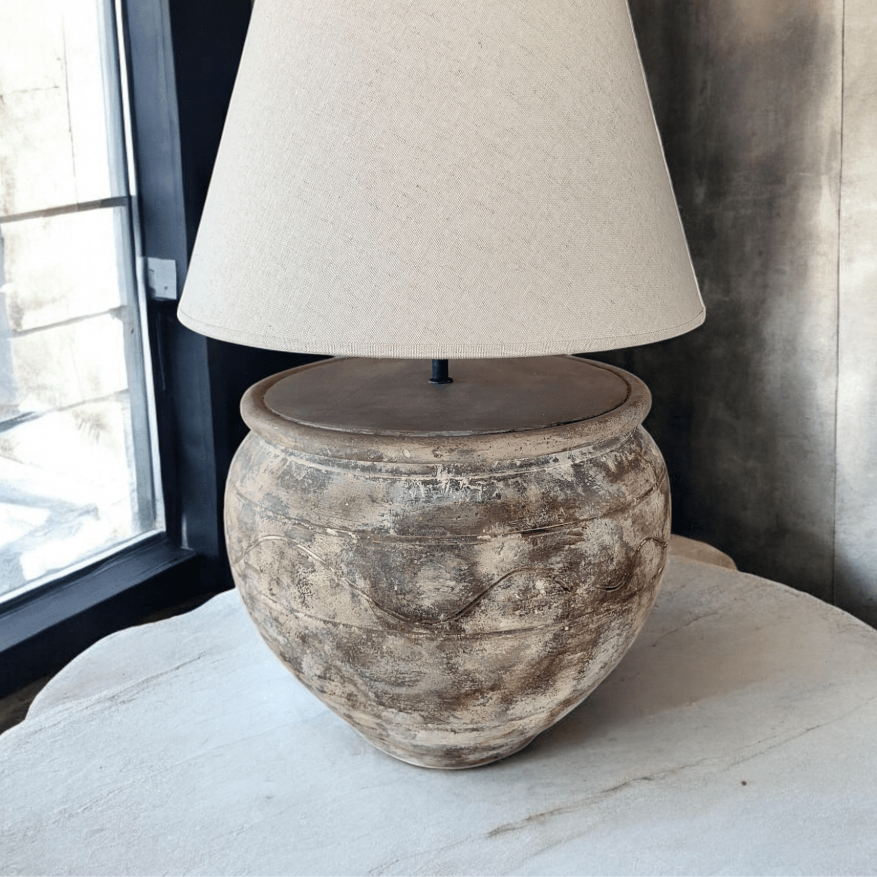 ArtisanbyMF Terracotta LV39 limited edition table lamp with a warm, textured terracotta finish and modern design.