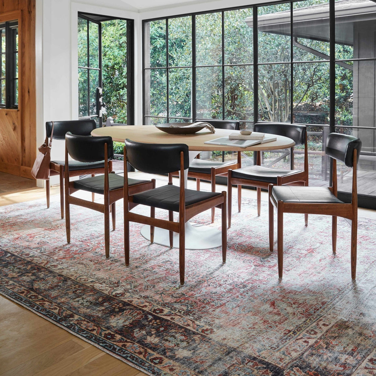 Large Anahawan Rust distressed washable area rug by Hauteloom, shown in a spacious room setting with a cozy, textured design.