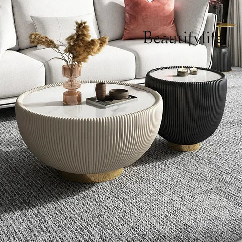 StepUp Coffee Italian style round coffee table with stone plate top from the Light Luxury Collection, limited edition design.